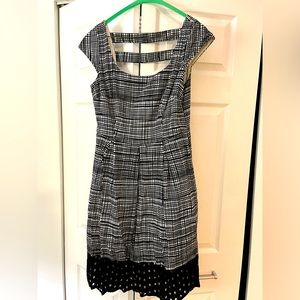 Black and white dress with black lace at the bottom